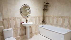 Suite, 1 Bedroom | Bathroom | Designer toiletries, hair dryer, bathrobes, slippers