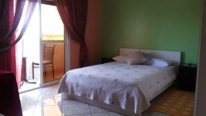 Deluxe Double Room, Balcony, Valley View | In-room safe, desk, bed sheets, wheelchair access