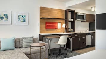Studio, 1 King Bed with Sofa bed | Living area | 32-inch Smart TV with cable channels, TV, Netflix