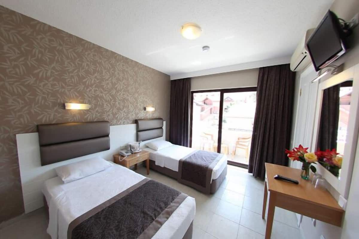 Camera Standard con 2 letti singoli | Culle/letti per bambini (gratuiti)