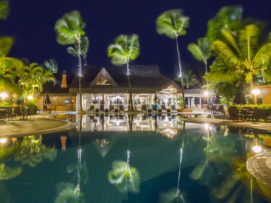 Outdoor pool, open 8:00 AM to 8:00 PM, pool umbrellas, pool loungers