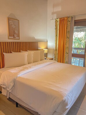 Minibar, caixa forta a l'habitació, cortines opaques i roba de llit 