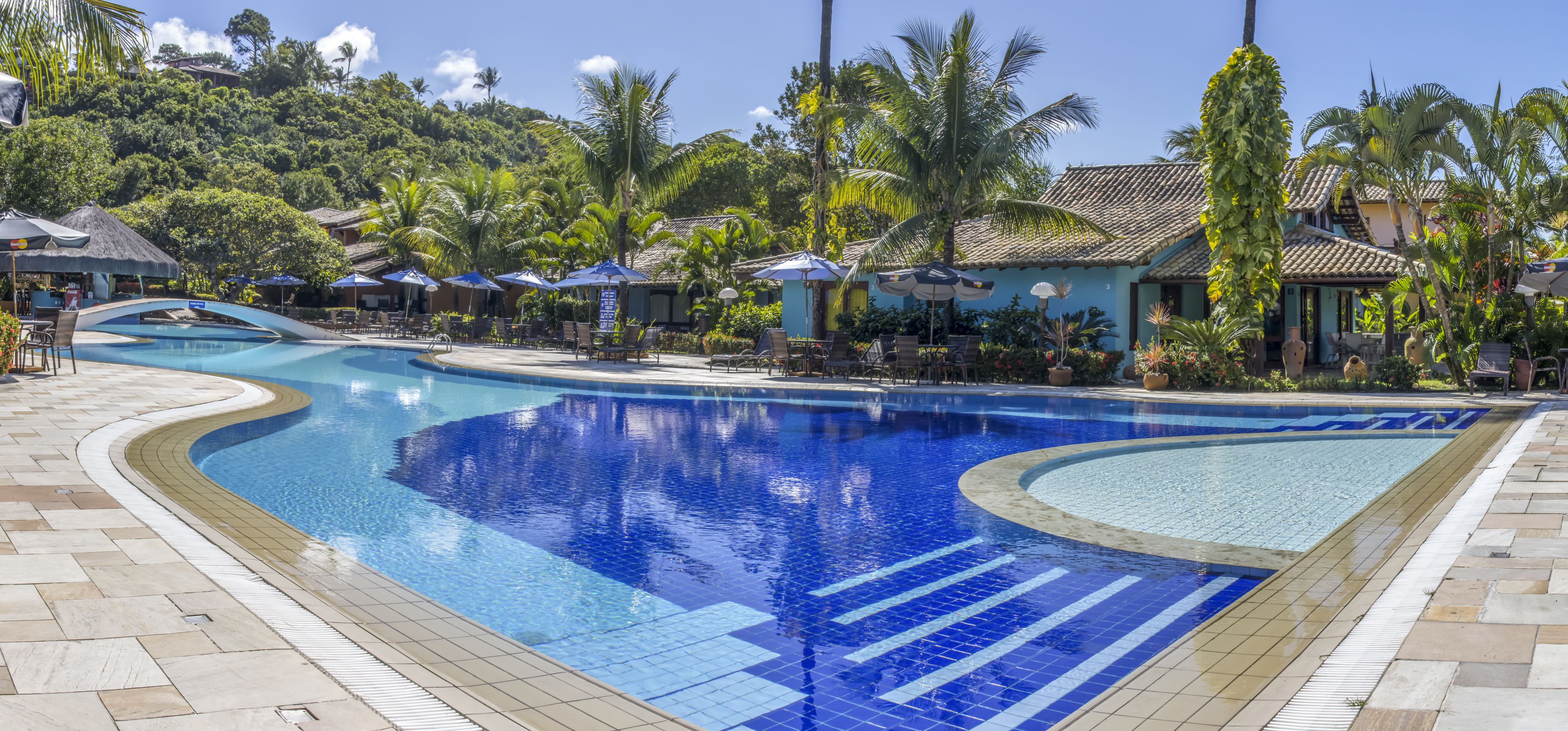 outdoor pool, pool umbrellas, pool loungers