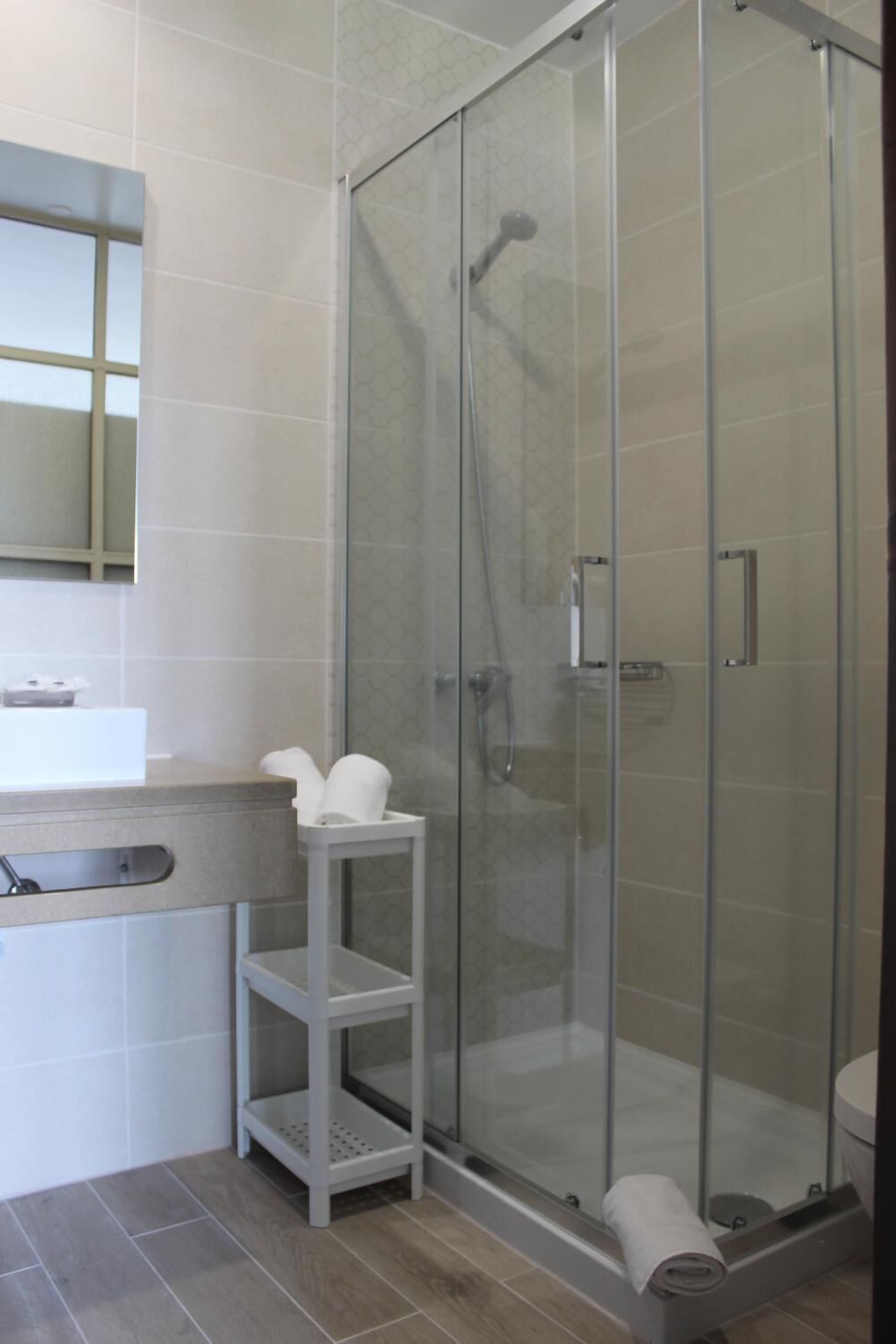 Shower, free toiletries, hair dryer, towels