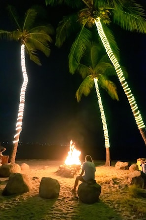 On the beach, sun-loungers, beach umbrellas, beach towels