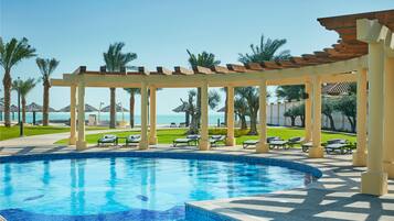 Outdoor pool, pool umbrellas, pool loungers