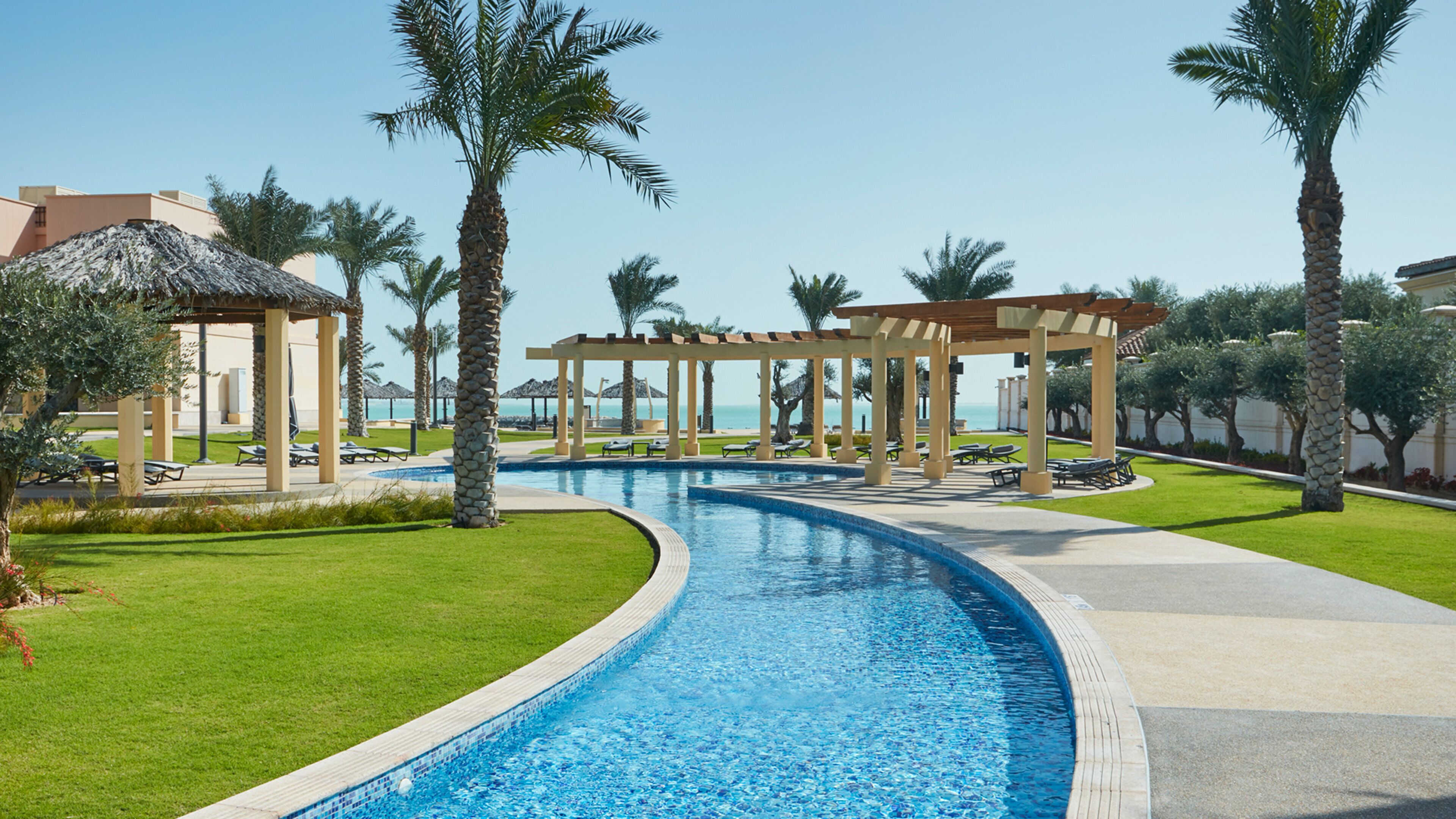 Outdoor pool, pool umbrellas, sun loungers