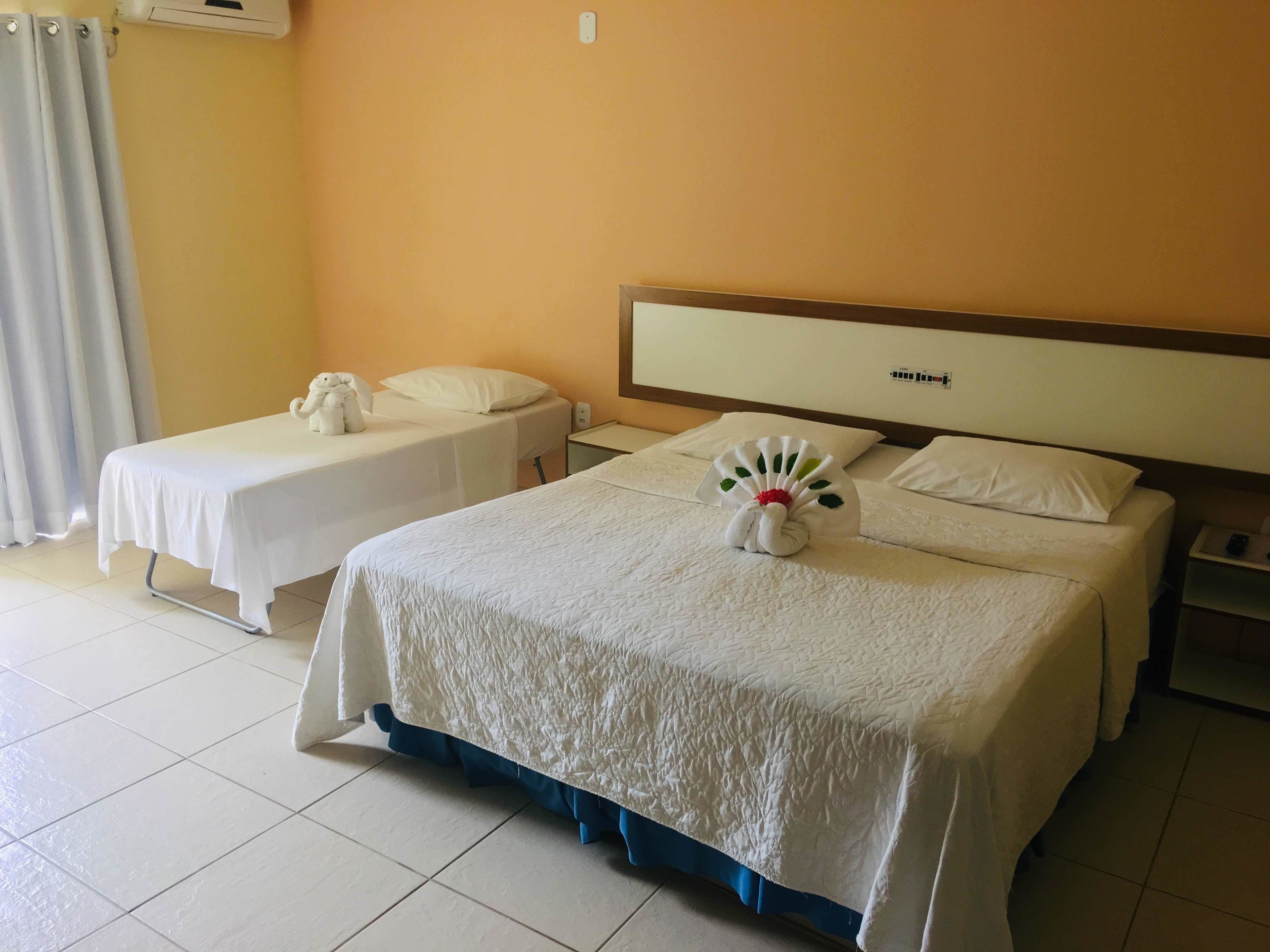 standard quadruple room | minibar, in-room safe, individually decorated, blackout curtains