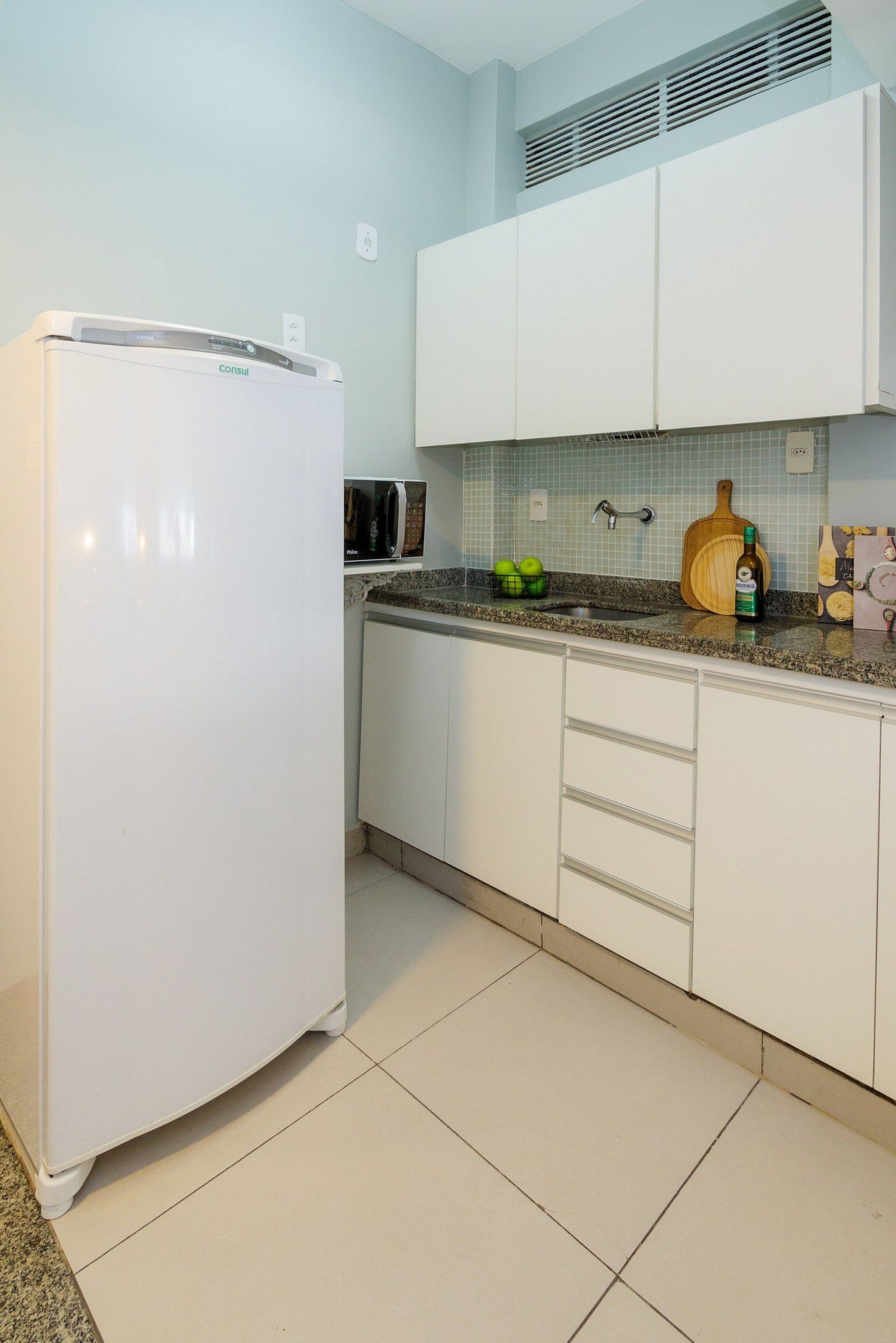 Apartamento | Cozinha privada | Cafeteira/chaleira, geladeira, micro-ondas, cooktop
