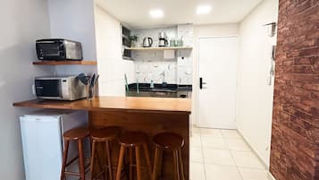 Apartment | Private kitchen | Fridge, microwave, stovetop, coffee/tea maker