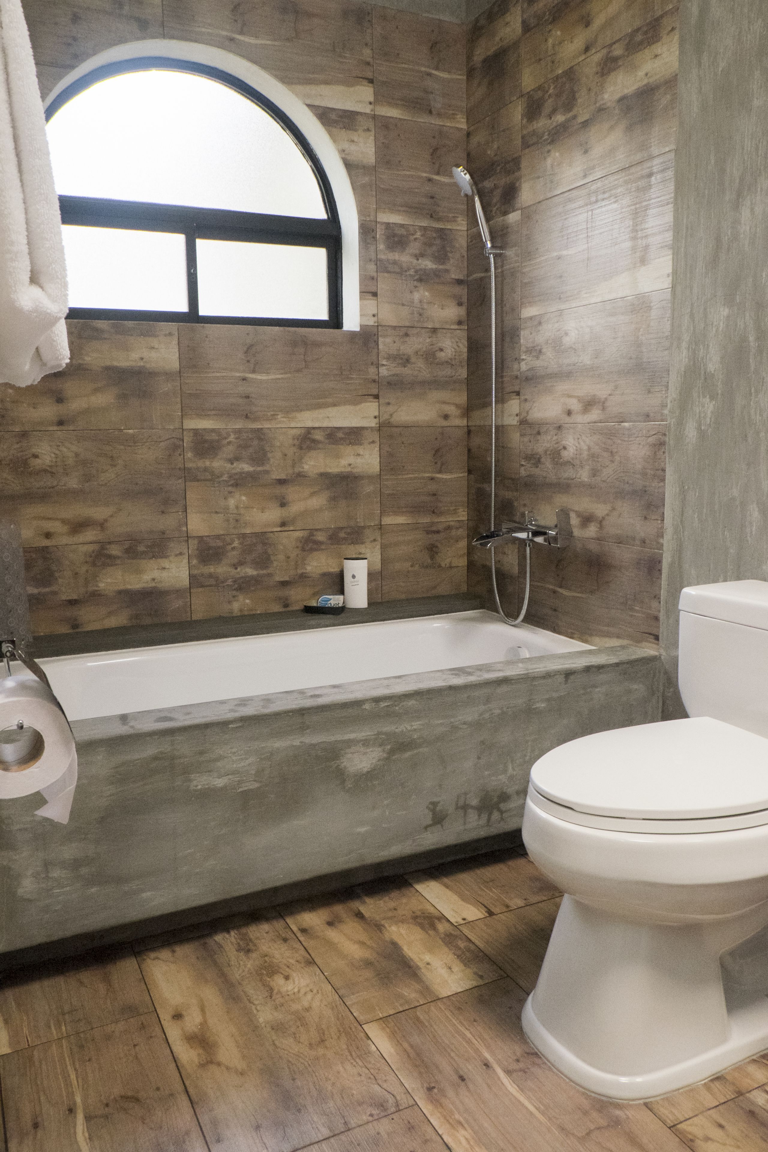 double room | bathroom | deep-soaking bathtub, rainfall showerhead, free toiletries, hair dryer