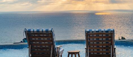 Outdoor pool, pool umbrellas, pool loungers