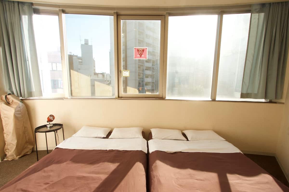 Chambre avec lits jumeaux (2 Double Beds) | Coffre-fort pour ordinateur portable, rideaux dâobscurcissement