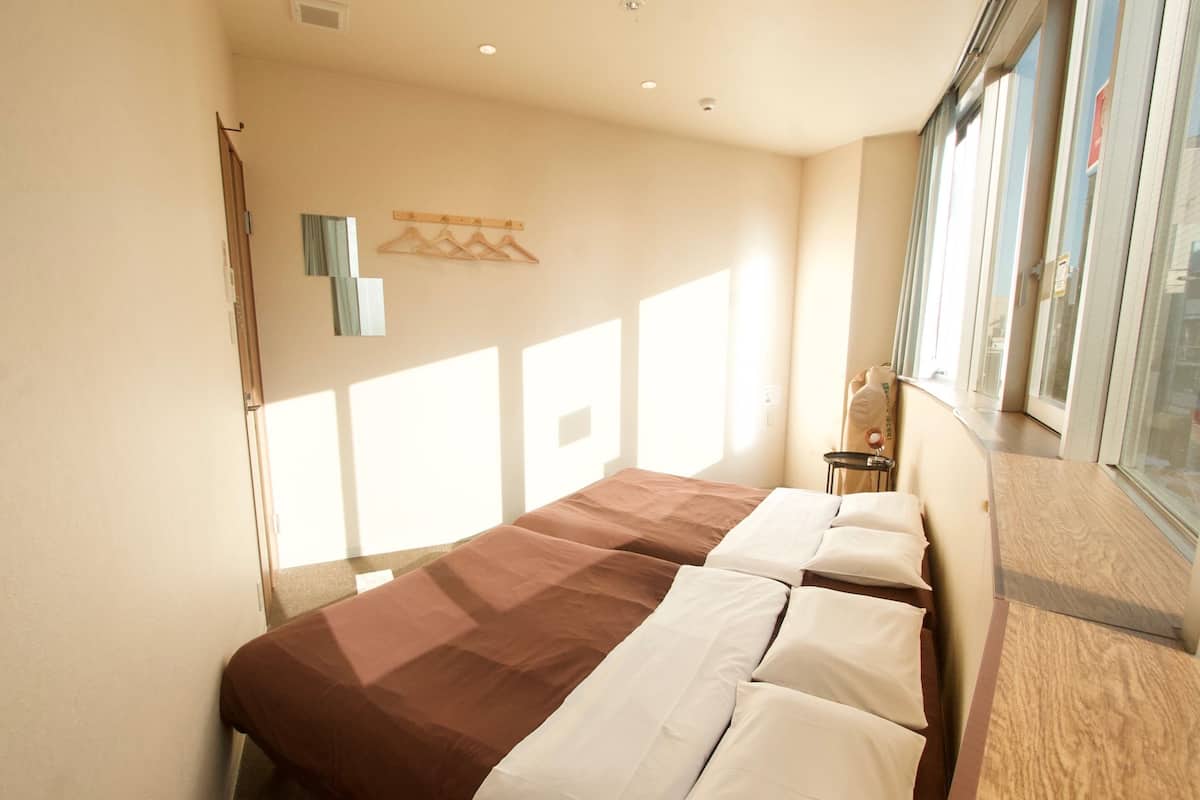 ห้องทวิน (2 Double Beds) | ตู้นิรภัยในห้องพัก, ผ้าม่านกันแสง, เตารีด/โต๊ะรีดผ้า, Wi-Fi ฟรี