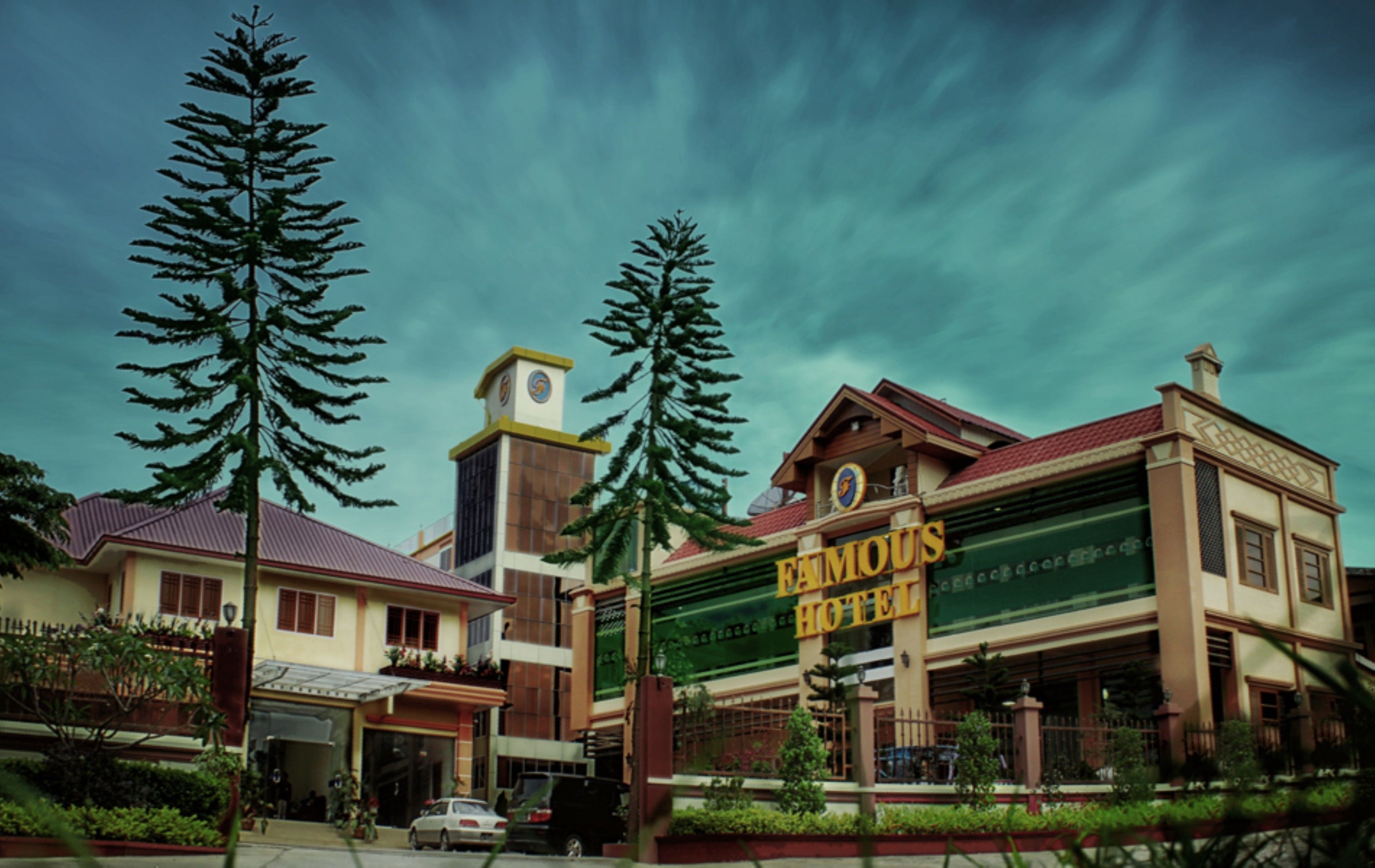 A hotel with a prominent sign reading "Famous Hotel."