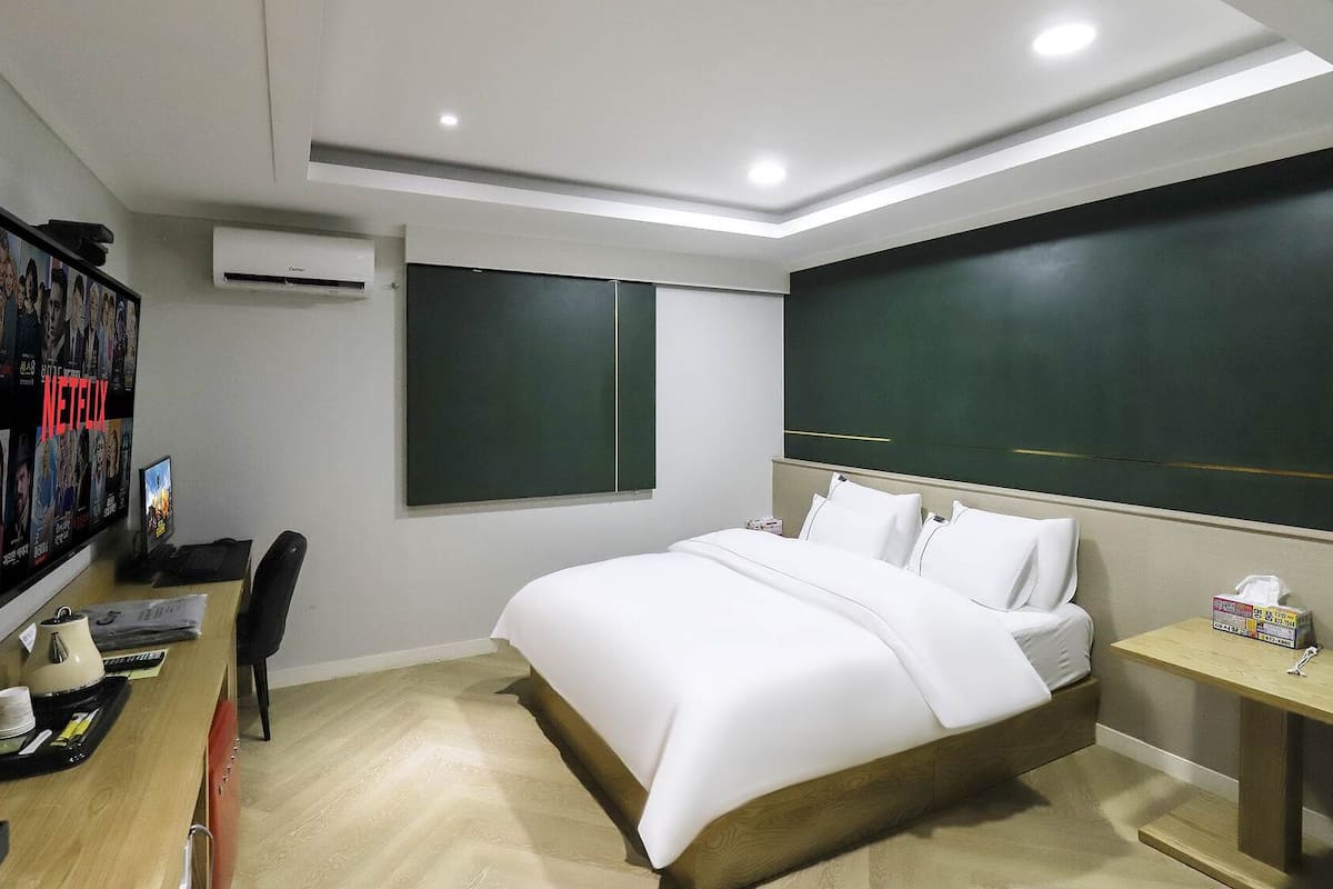 Premium bedding, down duvets, memory-foam beds, free WiFi