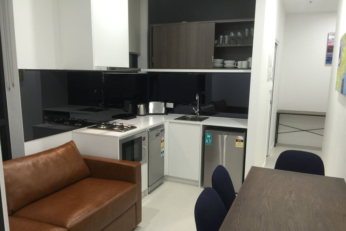 Family Apartment, Connecting Rooms | Private kitchenette | Coffee/tea maker, fridge, microwave, stovetop