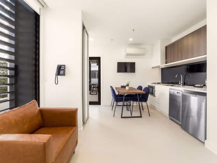 Executive One Bedroom Suite | Living room | 40-inch flat-screen TV with satellite channels, TV