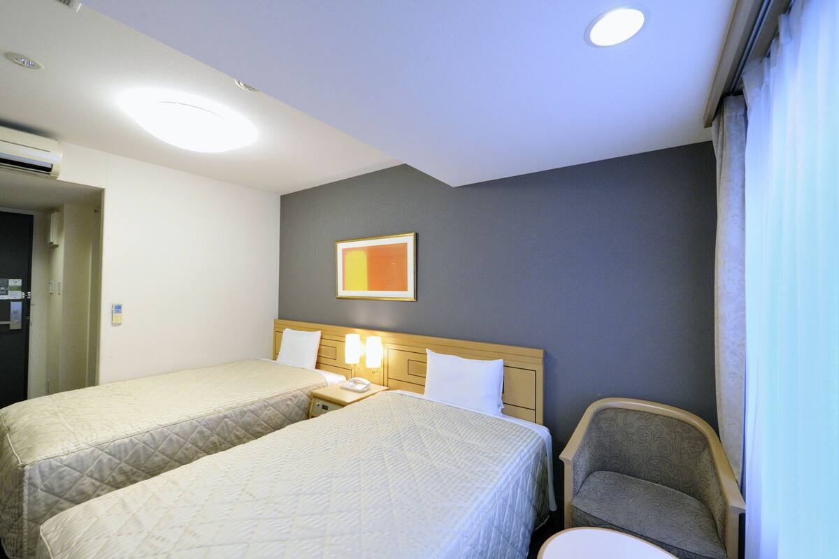 Desk, blackout curtains, free WiFi, bed sheets