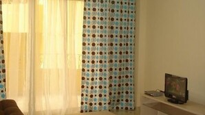 Apartment, 1 Bedroom | Living room | Flat-screen TV - British Resort Hurghada (Hurghada)