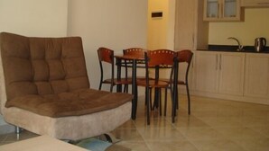 Apartment, 1 Bedroom | Living area | Flat-screen TV - British Resort Hurghada (Hurghada)