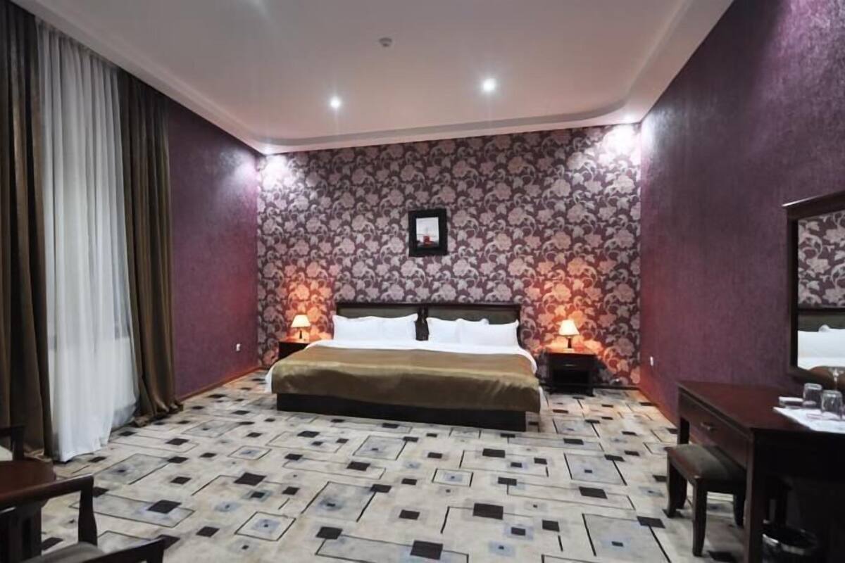 Exclusive Suite, 2 Bedrooms | Living area | LCD TV