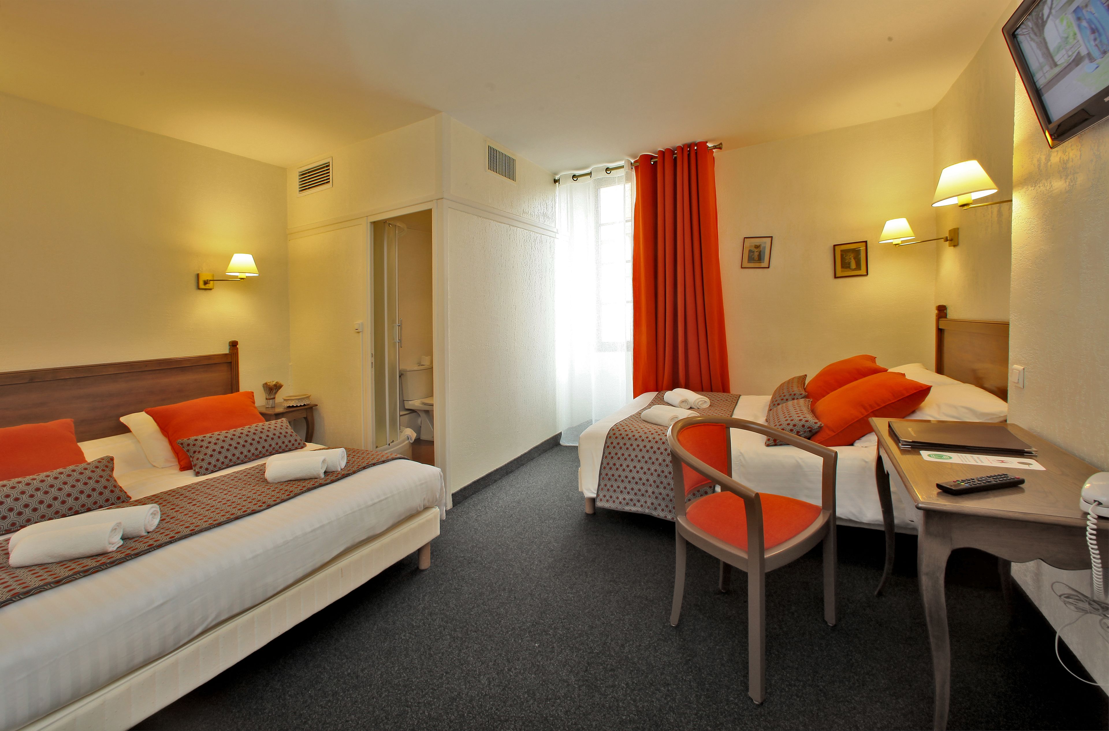 individually decorated, individually furnished, desk, blackout curtains