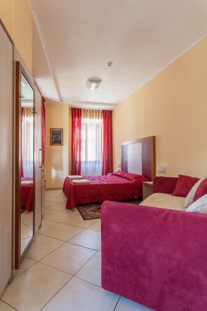Quadrupla Deluxe | Lenzuola Frette, minibar, una scrivania, insonorizzazione