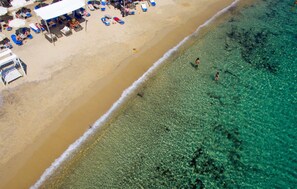 On the beach, white sand, sun loungers, beach umbrellas - Santana Beach (Naxos)