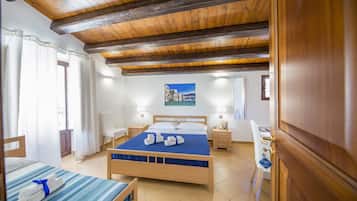 Triple Room, Balcony | Minibar, individually decorated, desk, soundproofing
