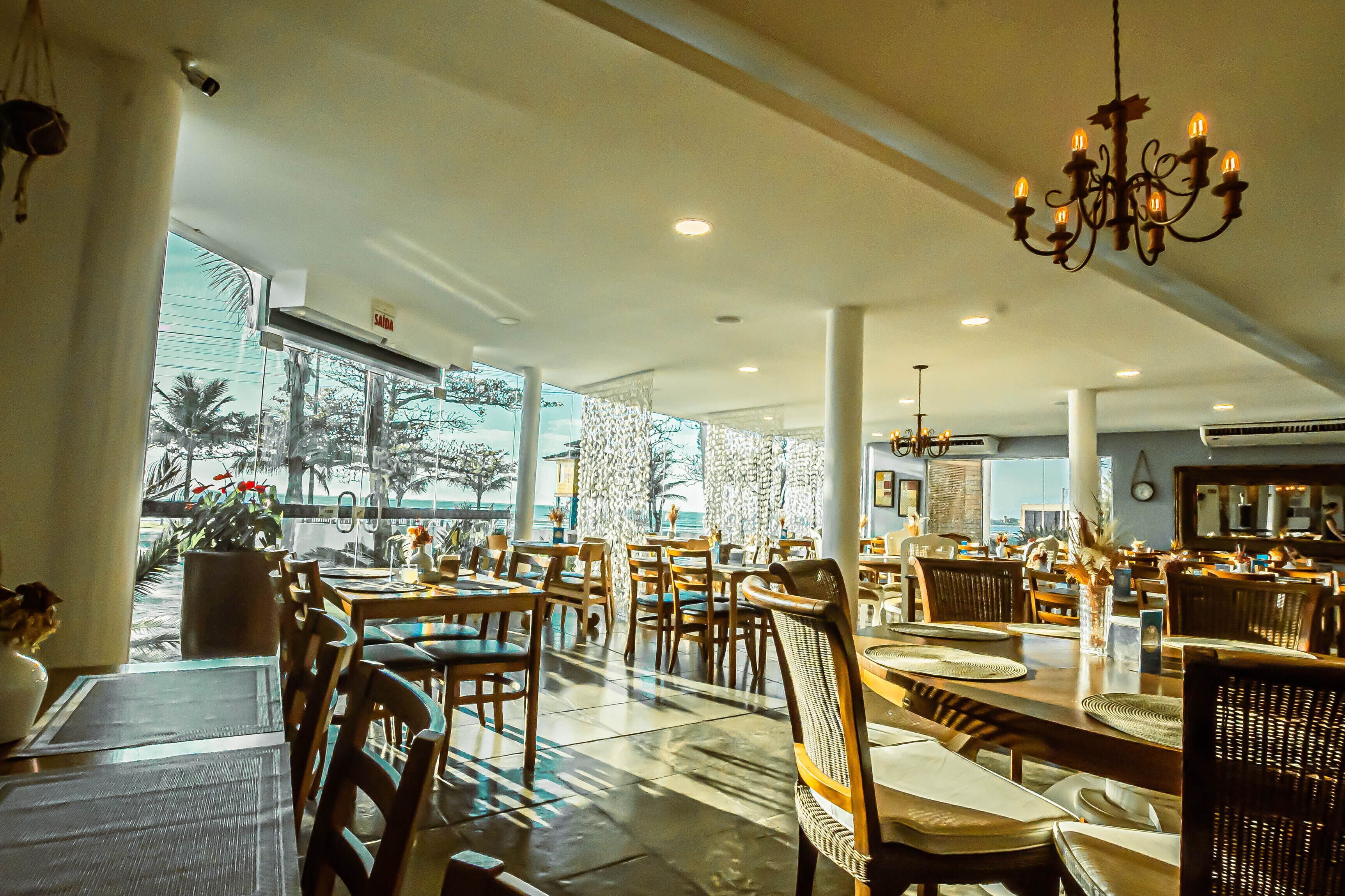 breakfast, lunch, dinner served; beach views