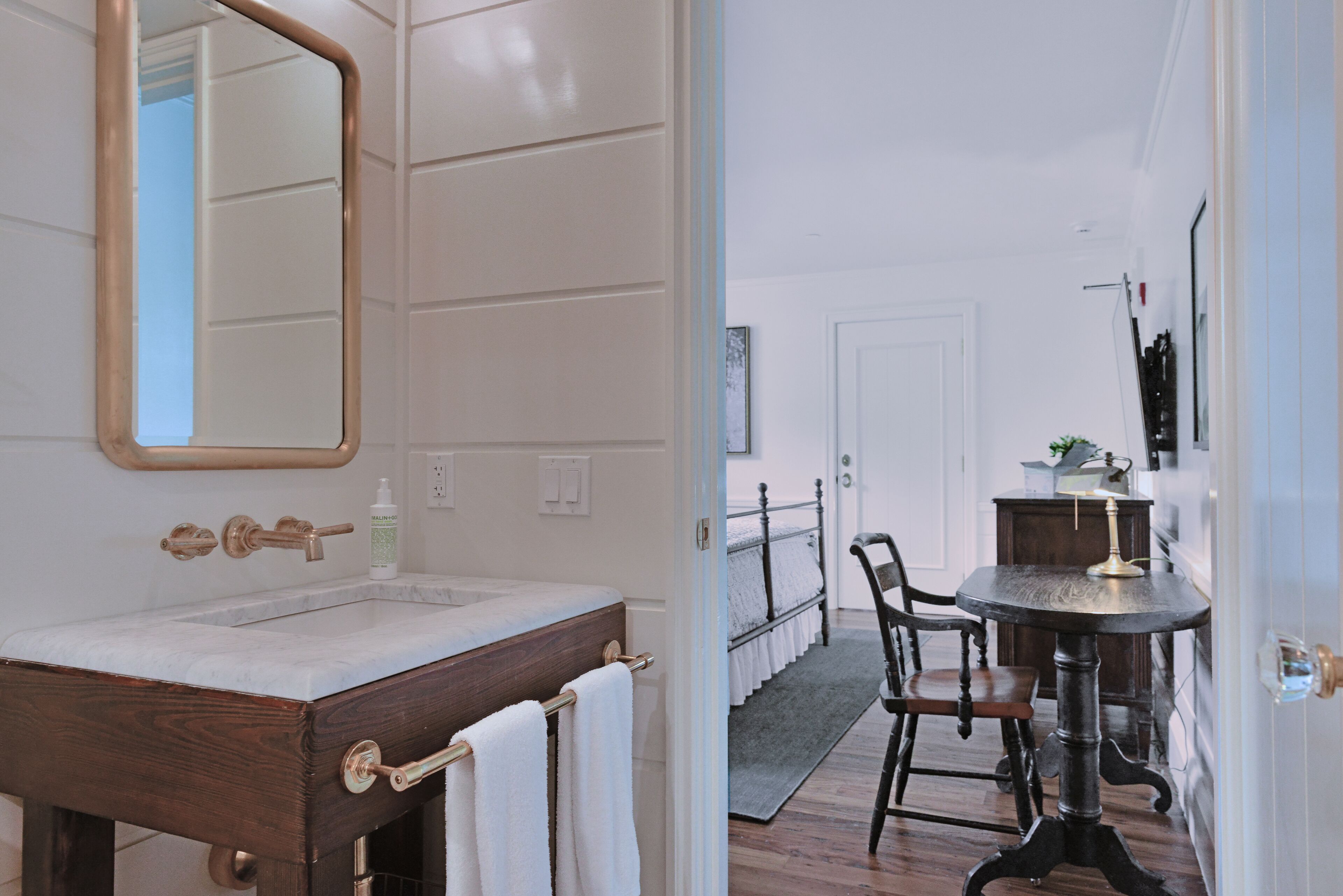 deluxe garden view basement level | bathroom | shower, designer toiletries, hair dryer, bathrobes