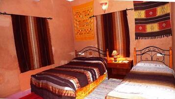 Standard Quadruple Room | Minibar, desk, iron/ironing board, free cribs/infant beds