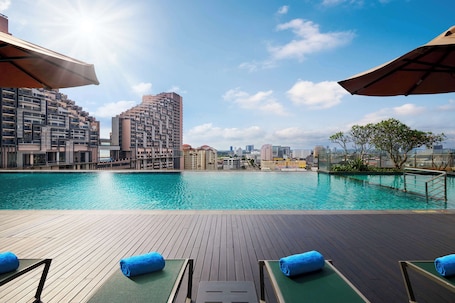 Outdoor pool, open 6:00 AM to 8:00 PM, sun loungers