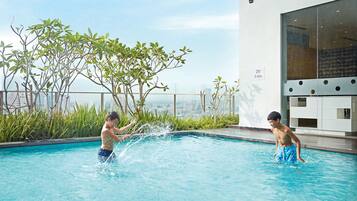 Outdoor pool, open 6:00 AM to 8:00 PM, pool loungers