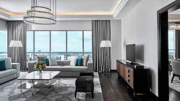 King Presidential Suite | Living area | 55-inch LED TV with satellite channels, TV