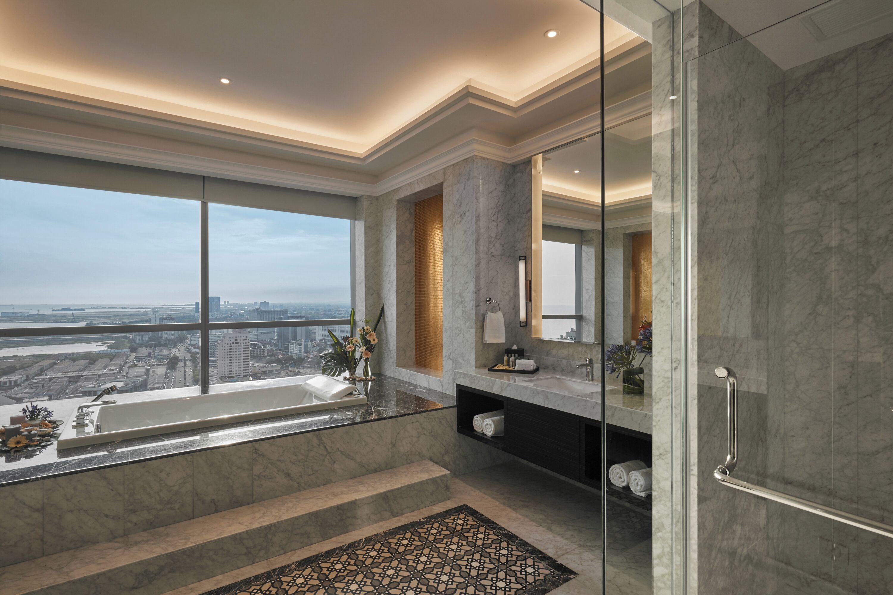 king presidential suite | bathroom | shower, rainfall showerhead, designer toiletries, hair dryer