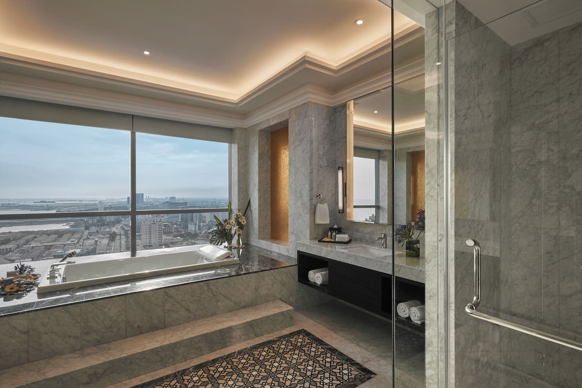 king presidential suite | bathroom | shower, rainfall showerhead, designer toiletries, hair dryer