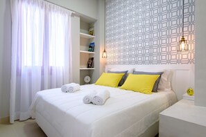 Suite junior, 1 habitación (A1) | Baño | Regadera, regadera tipo lluvia, amenidades de baño gratuitas 