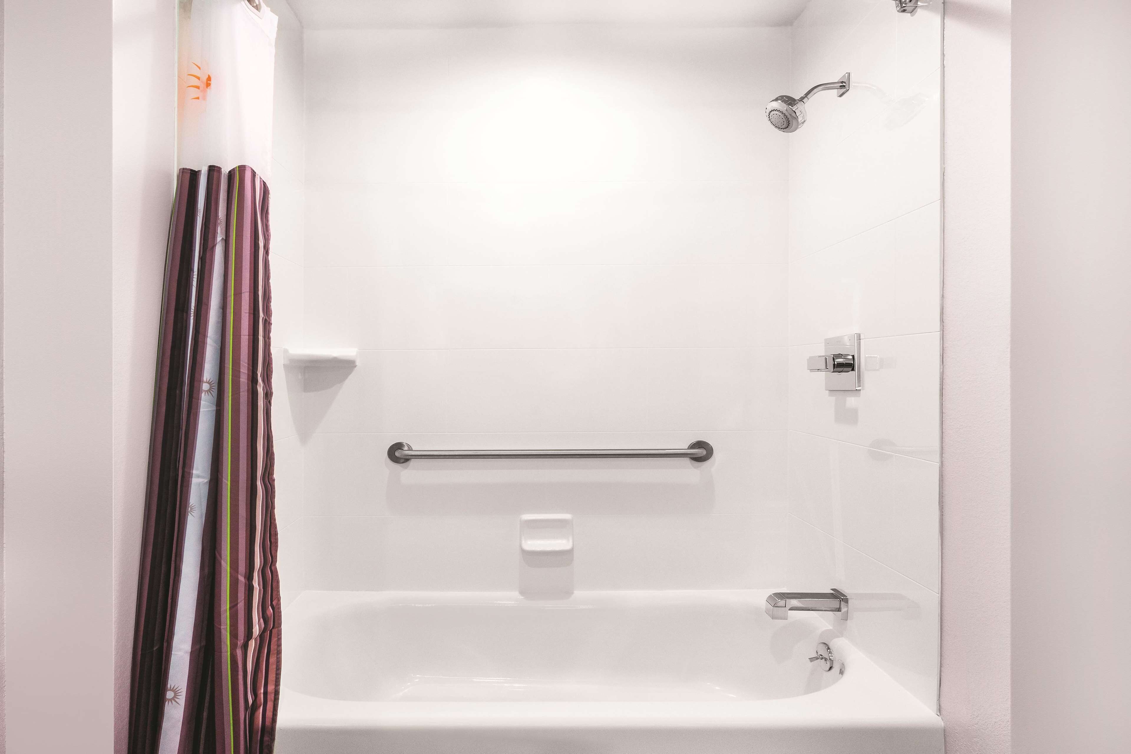 combined shower/bathtub, free toiletries, hair dryer, towels