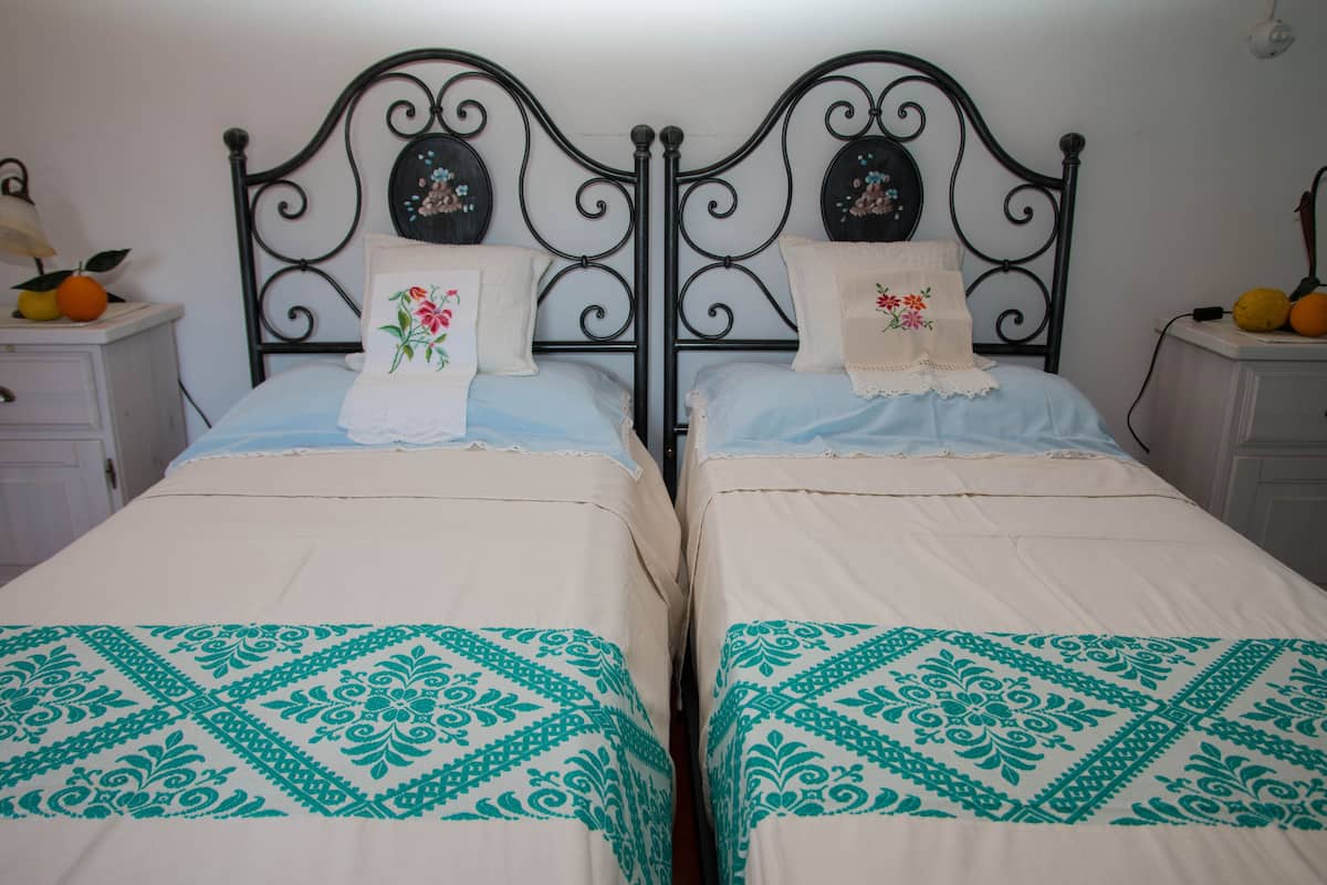 Standaard kamer, 1 twee- of 2 eenpersoonsbedden | 1 slaapkamer, beddengoed