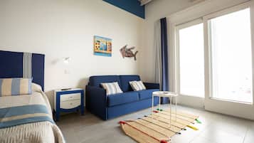 Family Quadruple Room | Minibar, in-room safe, desk, free WiFi