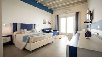 Family Quadruple Room | Minibar, in-room safe, desk, free WiFi