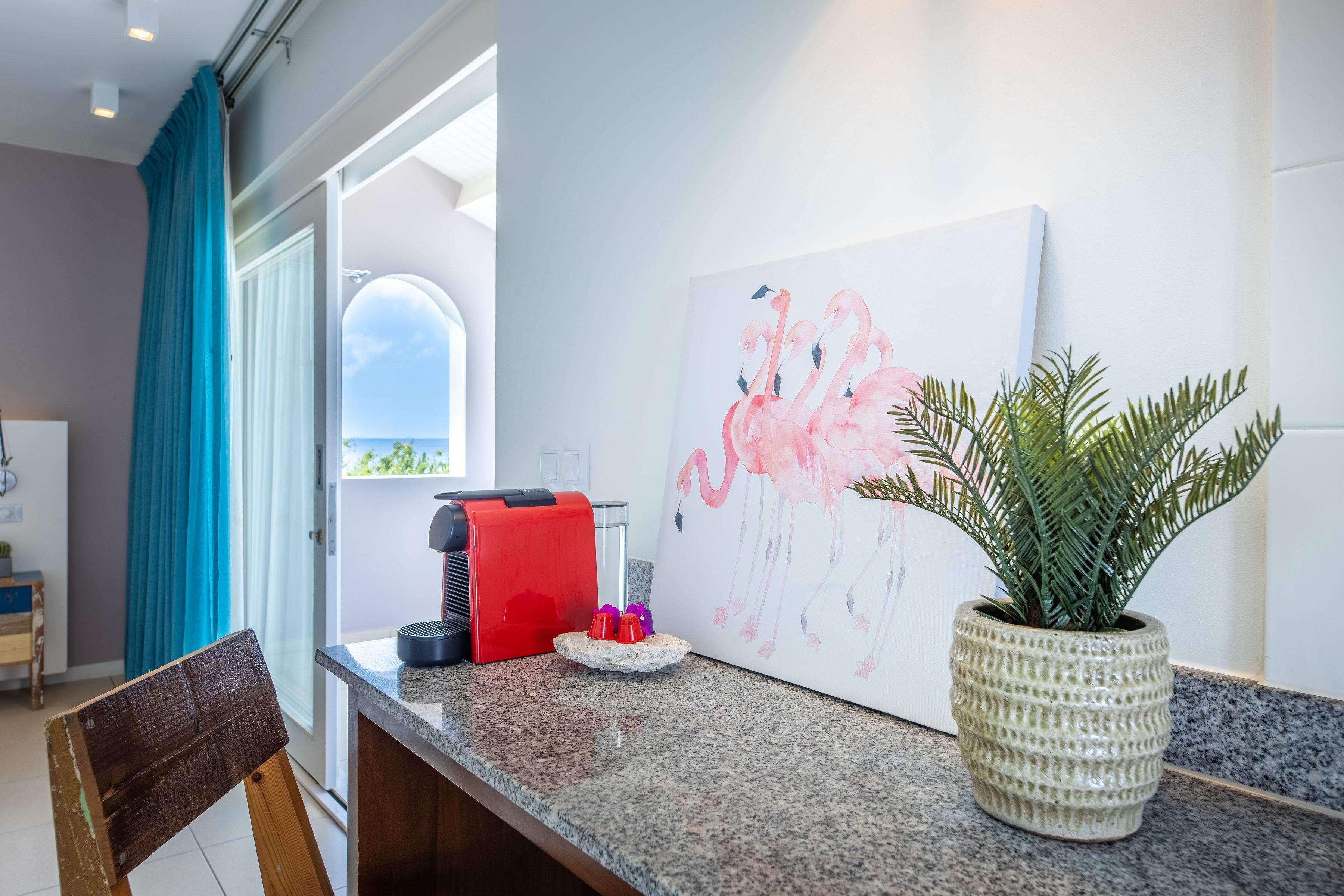 deluxe room, pool access, partial ocean view | 1 bedroom, premium bedding, in-room safe, laptop workspace