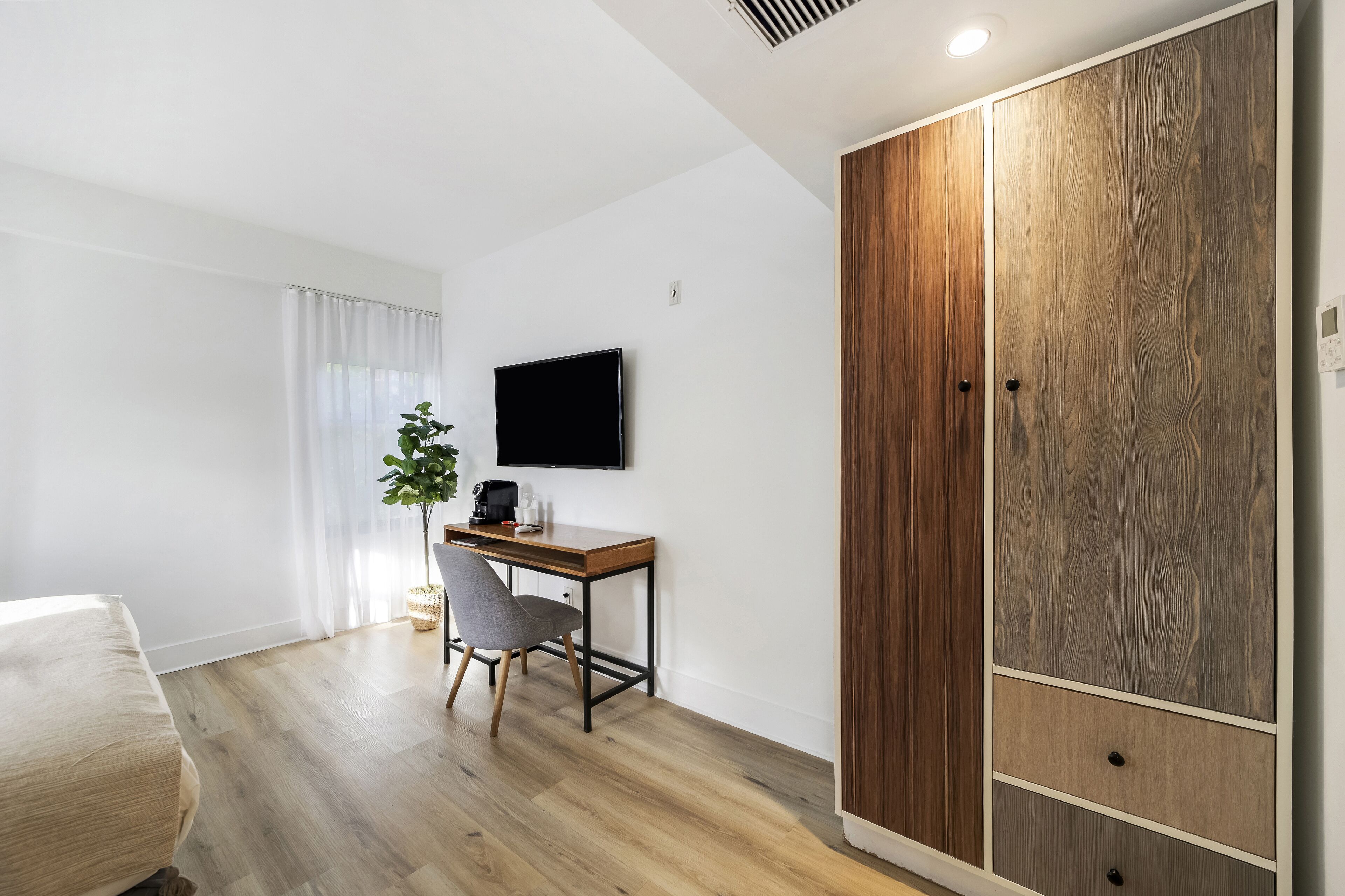 Room, 1 King Bed (Self check) | In-room safe, individually decorated, individually furnished, desk