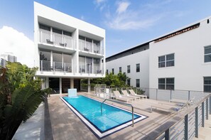 Outdoor pool, open 8:00 AM to 7:00 PM, pool loungers