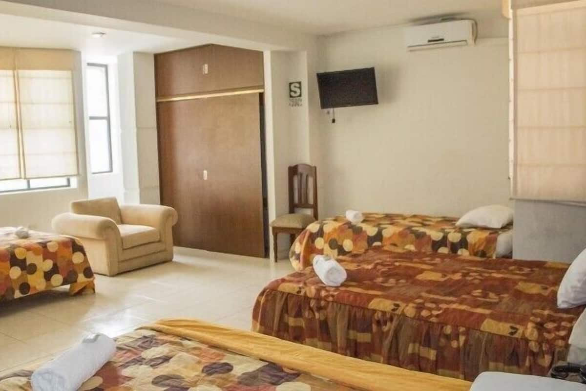 Quadruple Room | Minibar, in-room safe, desk, free cots/infant beds