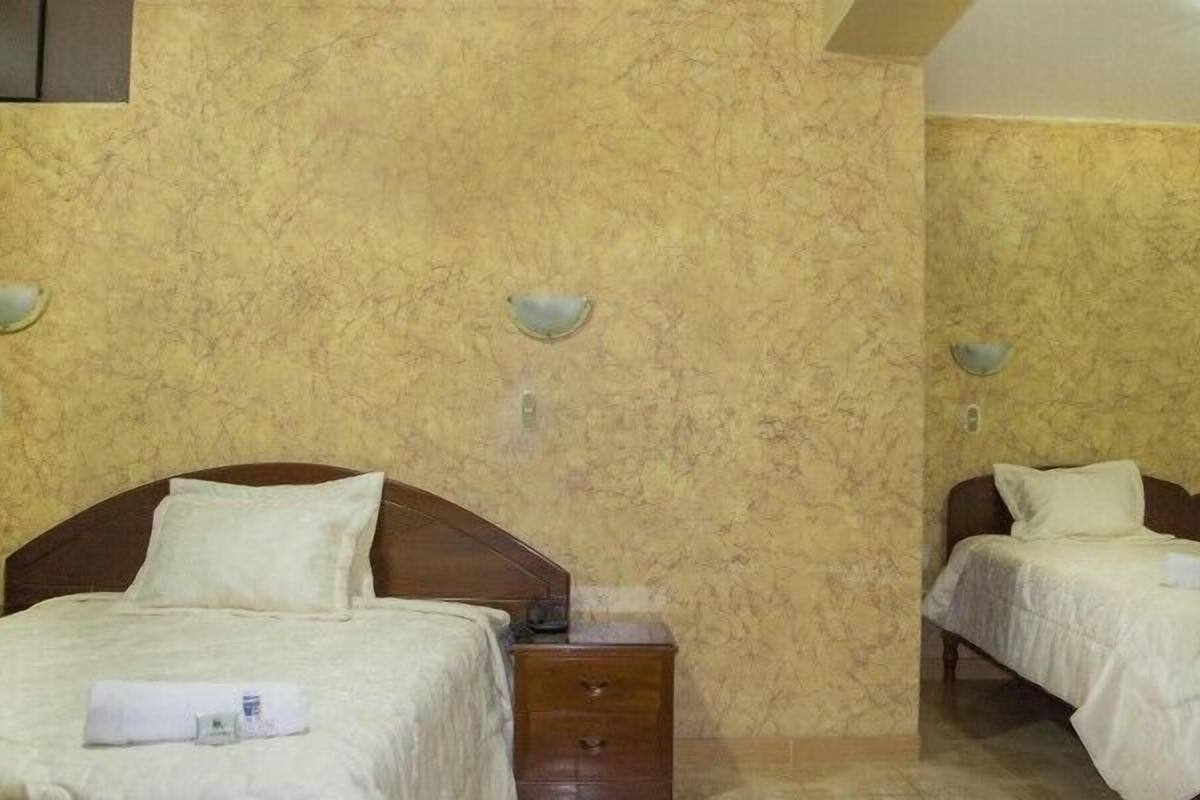 Twin Room | Minibar, in-room safe, desk, cribs (free)