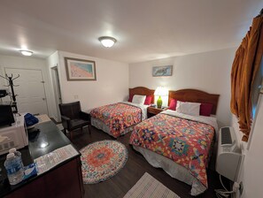 Sistema de insonorización y tabla de planchar con plancha 