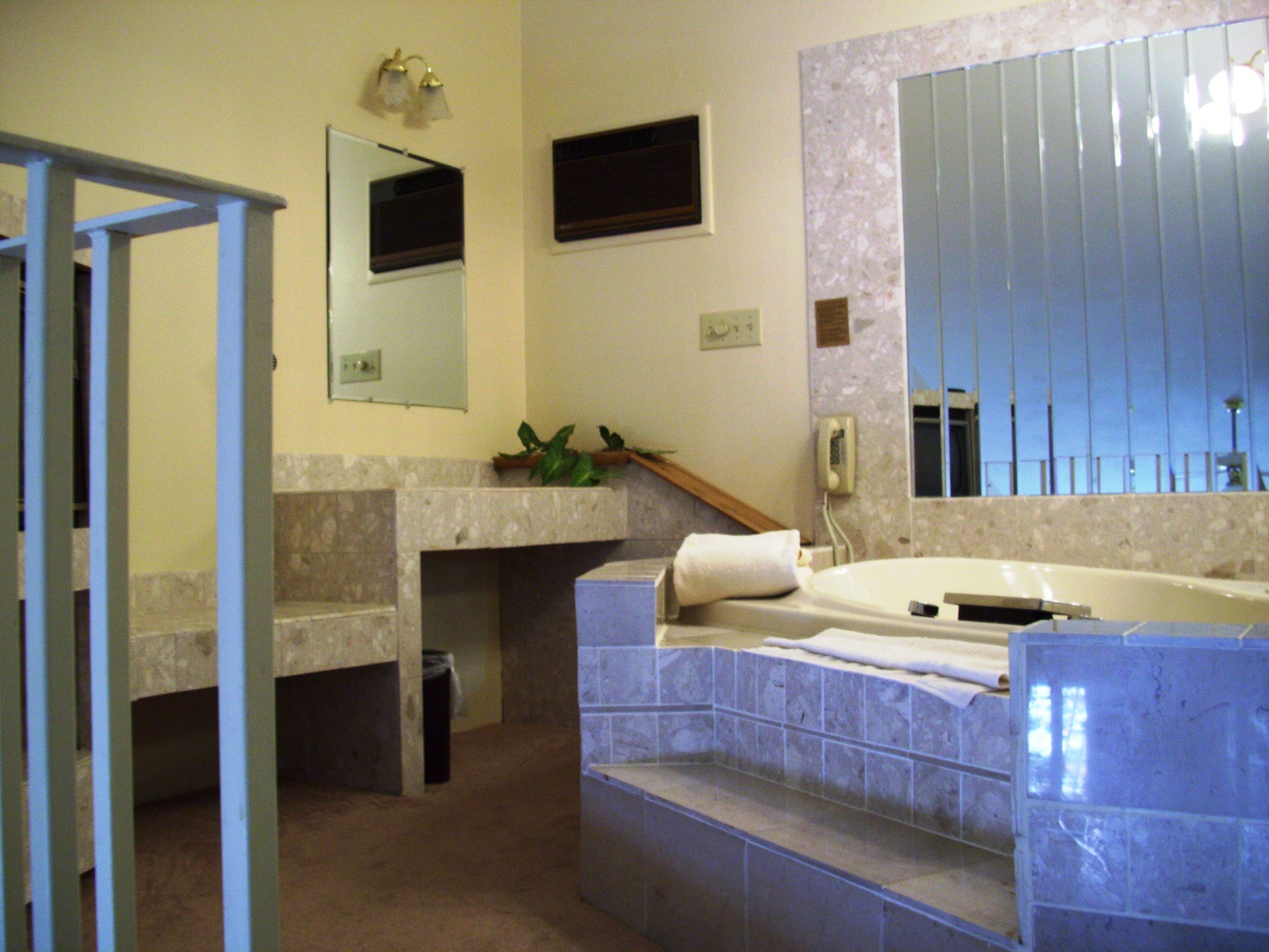 superior loft, 1 double bed, jetted tub, marina view | 1 bedroom, iron/ironing board, free wifi, bed sheets